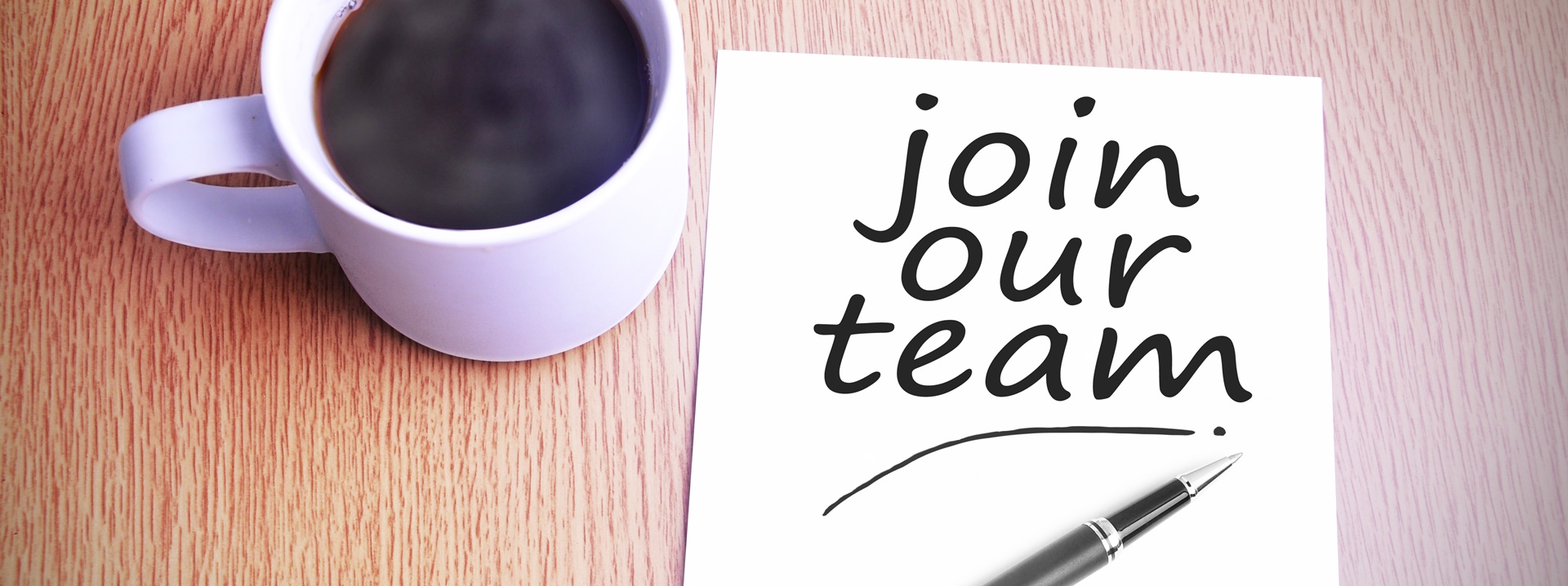 Coffee on the table with note writing writing join our team