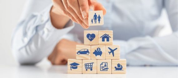 Close-up of hand stacking wooden blocks, symbolising the flexibility and customisation of Choice Protect360 Close-up of hand stacking wooden blocks, symbolising the flexibility and customisation of Choice Protect360