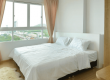 View of bedroom of high-rise apartment