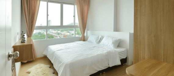 View of bedroom of high-rise apartment View of bedroom of high-rise apartment