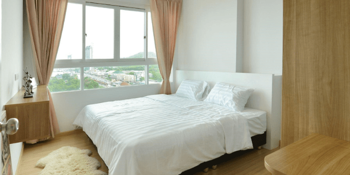View of bedroom of high-rise apartment
