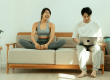 couple on a sofa at home