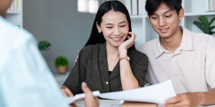 Couple looking at maid policies
